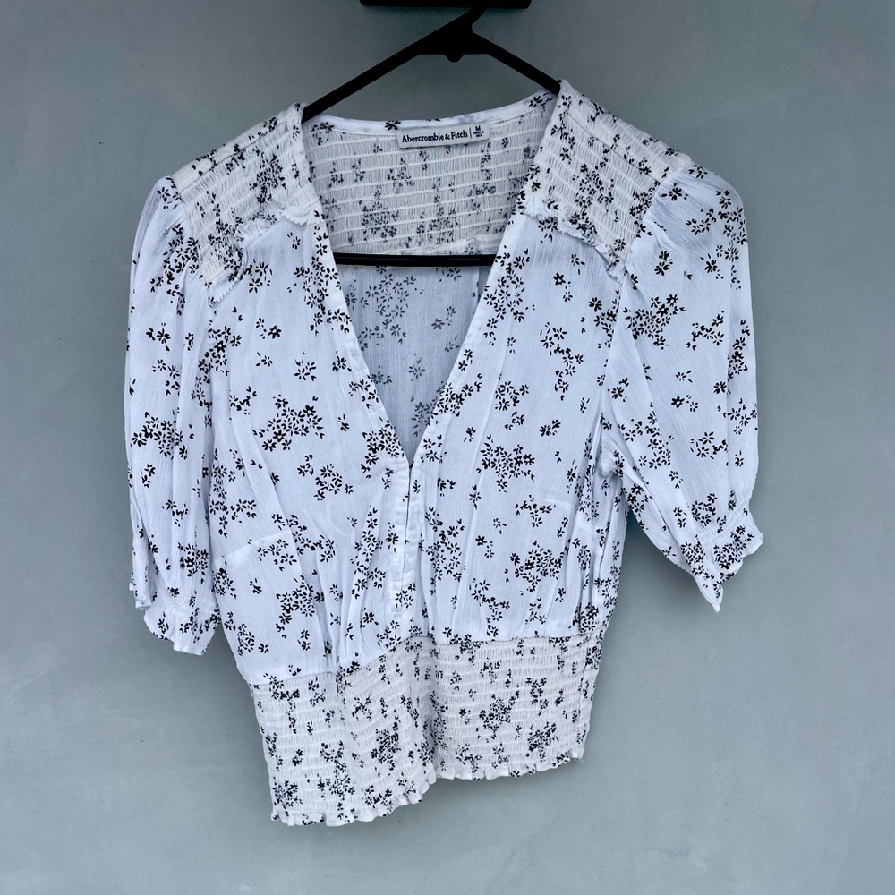 Abercrombie and fitch white floral top with black flowers size medium.